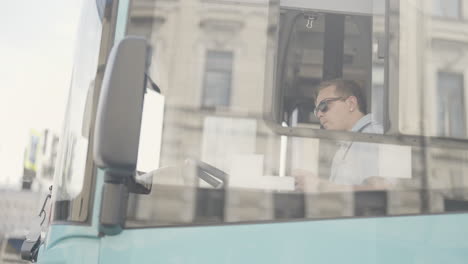 bus driver enjoying a drink