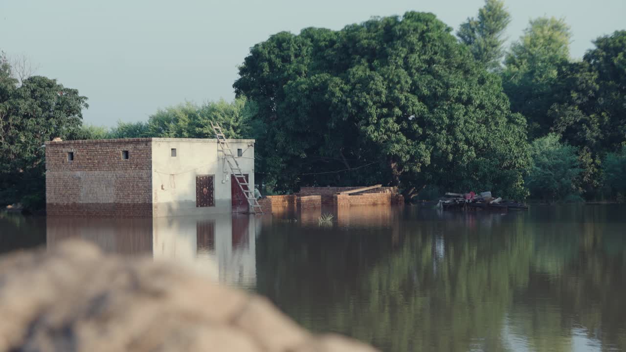Family home inundated by floodwaters, a devastating crisis in rural Pakistan