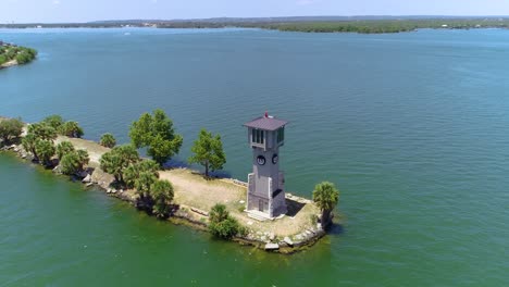 aerial drone video of lighthouse on a peninsula near horseshoe bay, texas