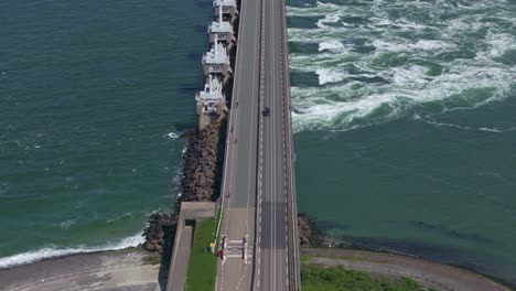 wide shot of famous oosterscheldekering during day time, aerial