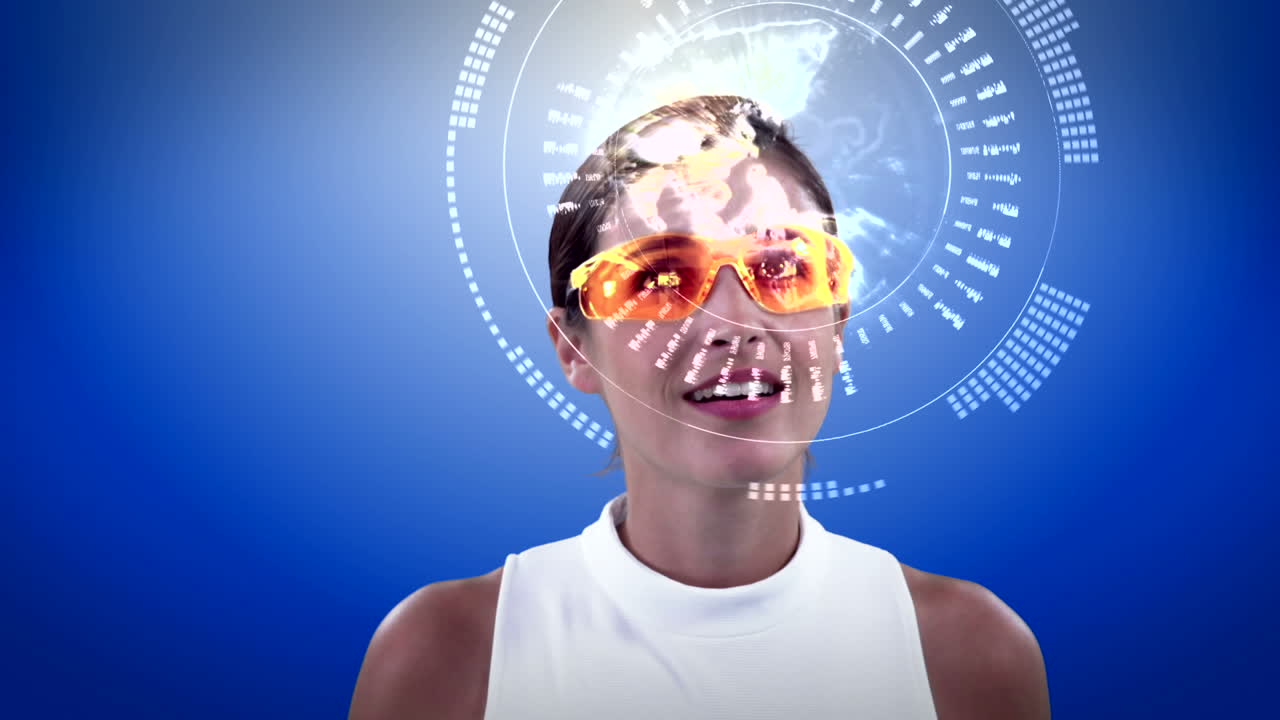 Businesswoman looking at digitally generated graphic