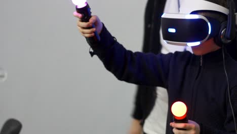 Kid-boy-playing-virtual-reality-game.-Boy-using-virtual-reality-headset