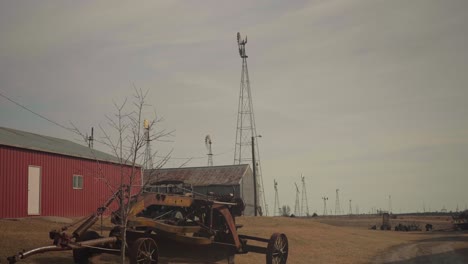 american countryside farm and windmill windpump towers, static view