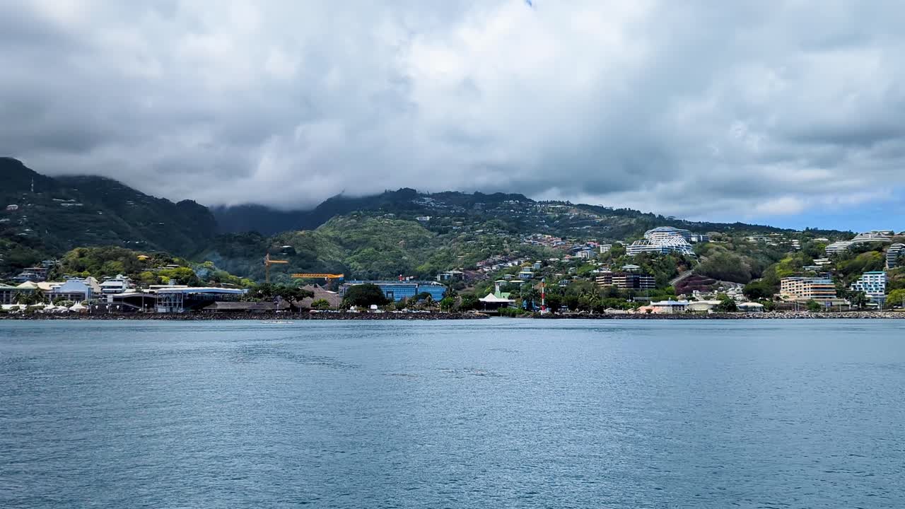 Scenic ocean view of capital city of Papeete on tropical Tahiti island in French Polynesia