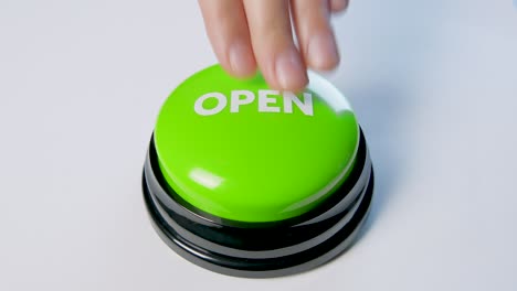 young woman pressing green open button. 4k footage. access something on the internet.