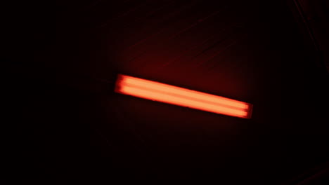 red - orange neon tube light slow and smooth camera rotating