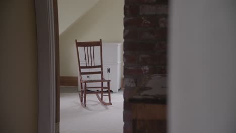 the-large-rocking-chair-swaying-in-cabin