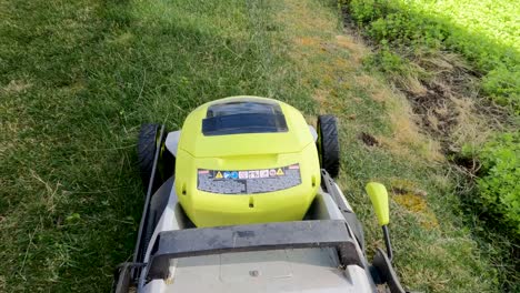 action cam shot of an electric lawn mower