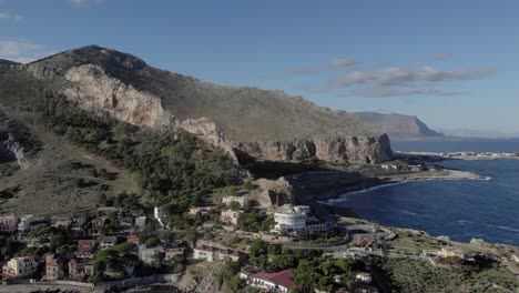 sun, shade and bellevue del golfo hotel in hot sicily mountain aerial