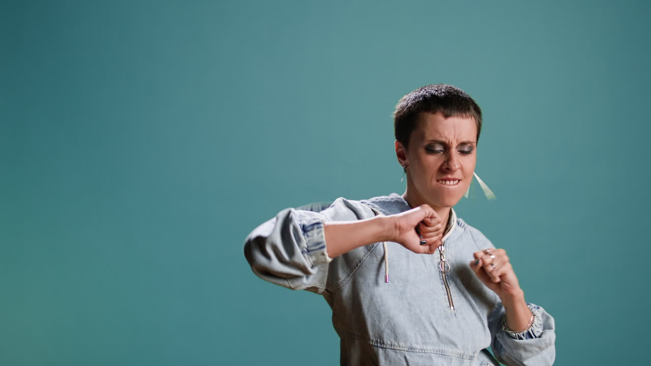 Woman dancing in denim jacket