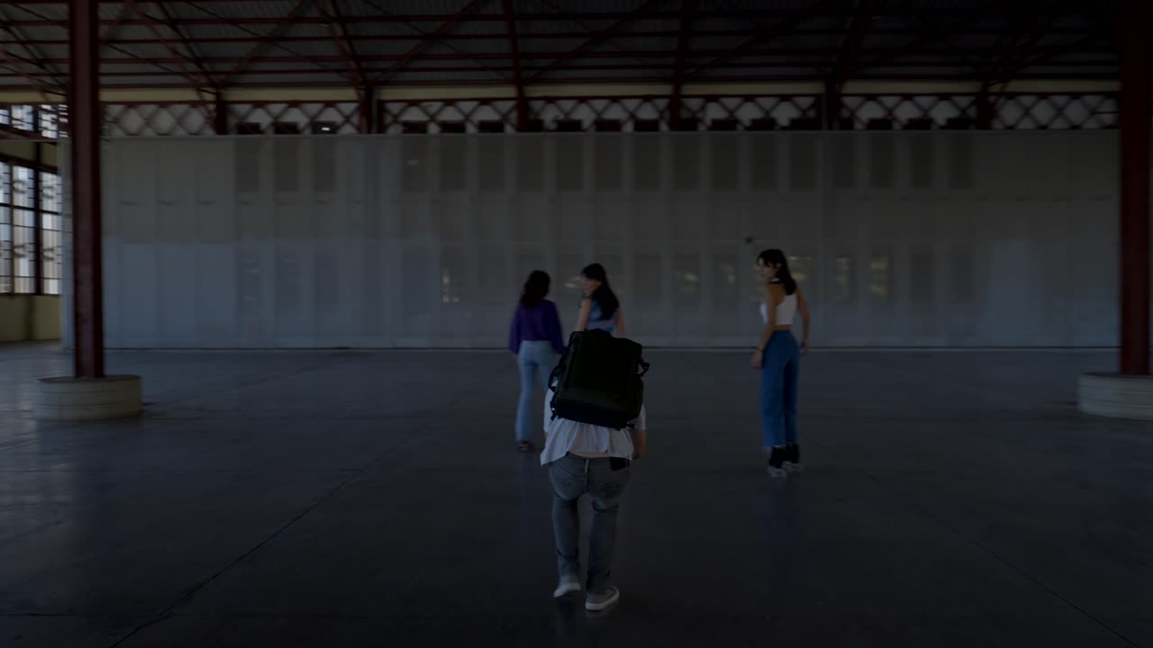 People Roller Skating in an Urban Market Hall