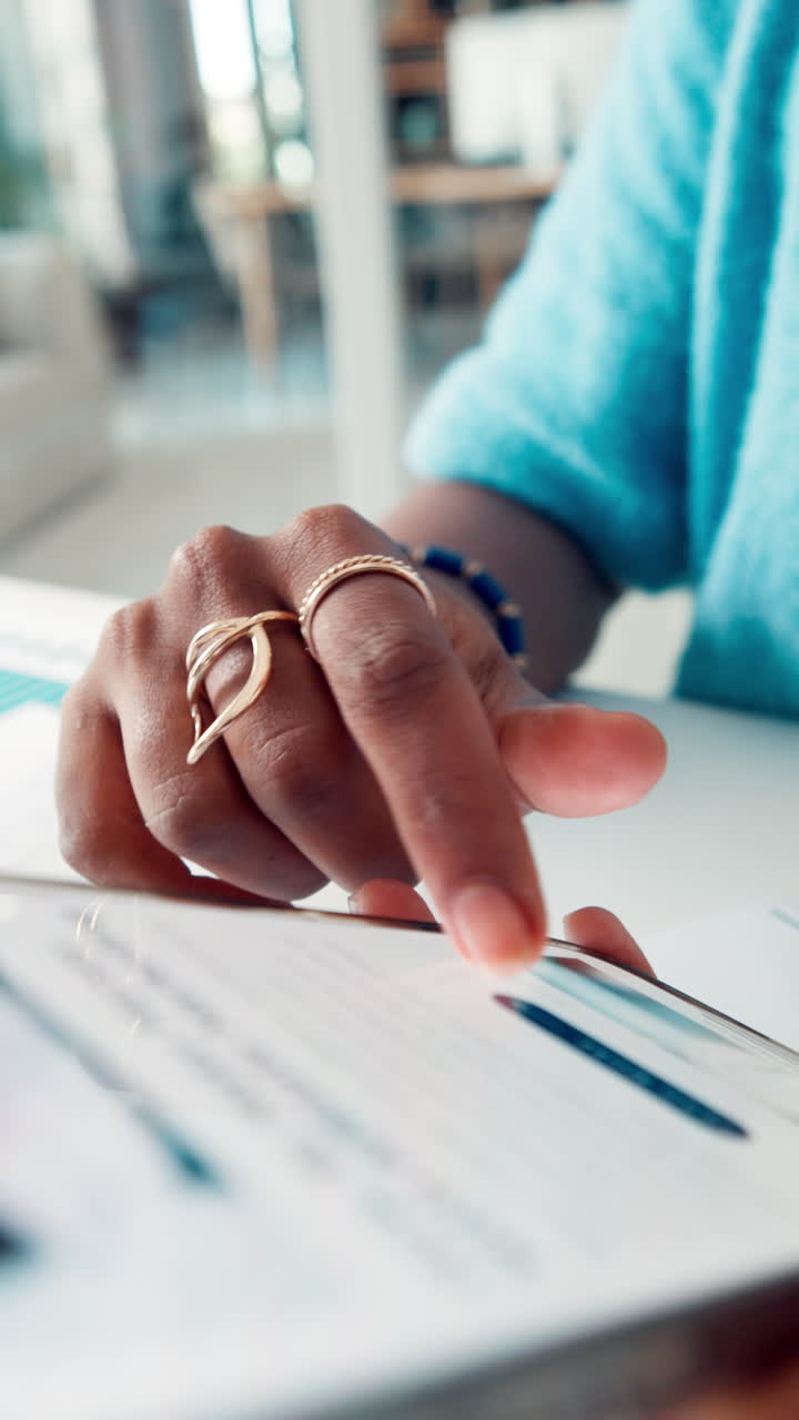 Close-up of Hand Using Digital Tablet