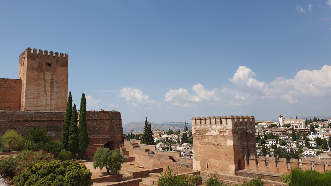 View of Alcazaba fortress, Granada city in background. Static tripod