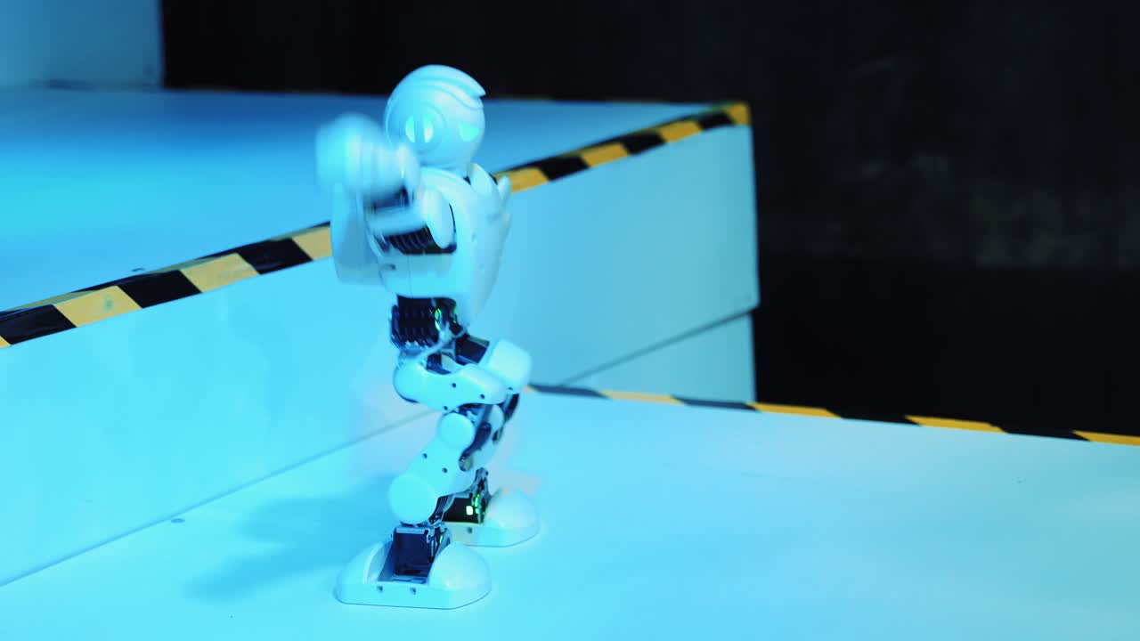 Dancing Robot humanoid. Artificial Intelligence dance at exhibition pavilion showroom. Robotic technology