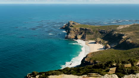 pristine diaz beach at cape point protected by rugged cliffs