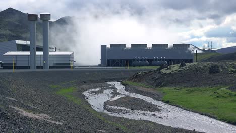 establishing shot of a geothermal power plant in iceland where clean electricity is generated 4