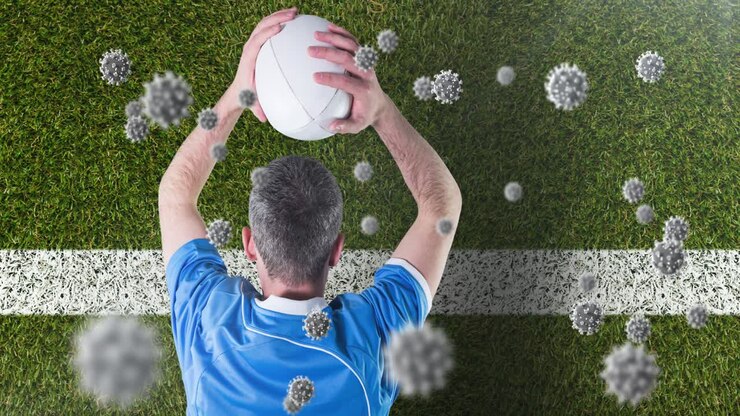 Animazione di un'interfaccia digitale con una serratura di sicurezza che ruota sopra giocatori di rugby