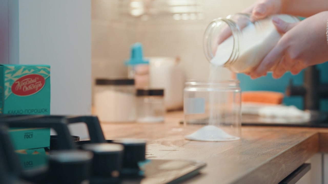 Cooking sugar scene. Scene of confectionery preparations with spices in bustling kitchen environment. Vibrant kitchen scene depicting sugar and spice mixing during dessert crafting process