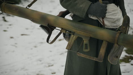 wwii german soldier with grenade launcher in winter