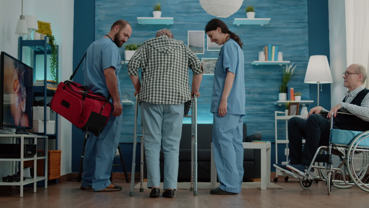 Medical assistants giving support to disabled woman