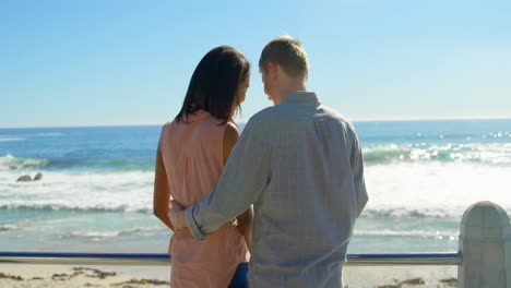 happy young couple taking selfie on mobile phone near railings 4k