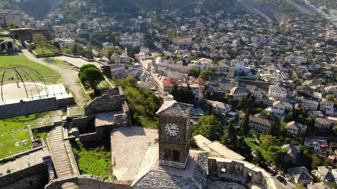 Bell tower Kulla e Sahatit on the fortress in Gjirokastra in the background old and new town