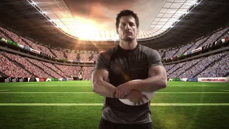 serieuze rugbyspeler houdt rugbybal vast