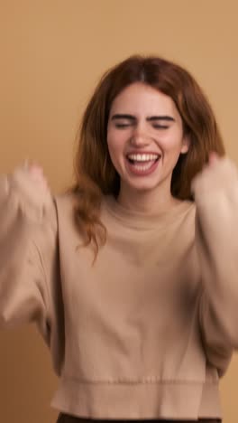woman shouting in rage looking at camera. vertical footage