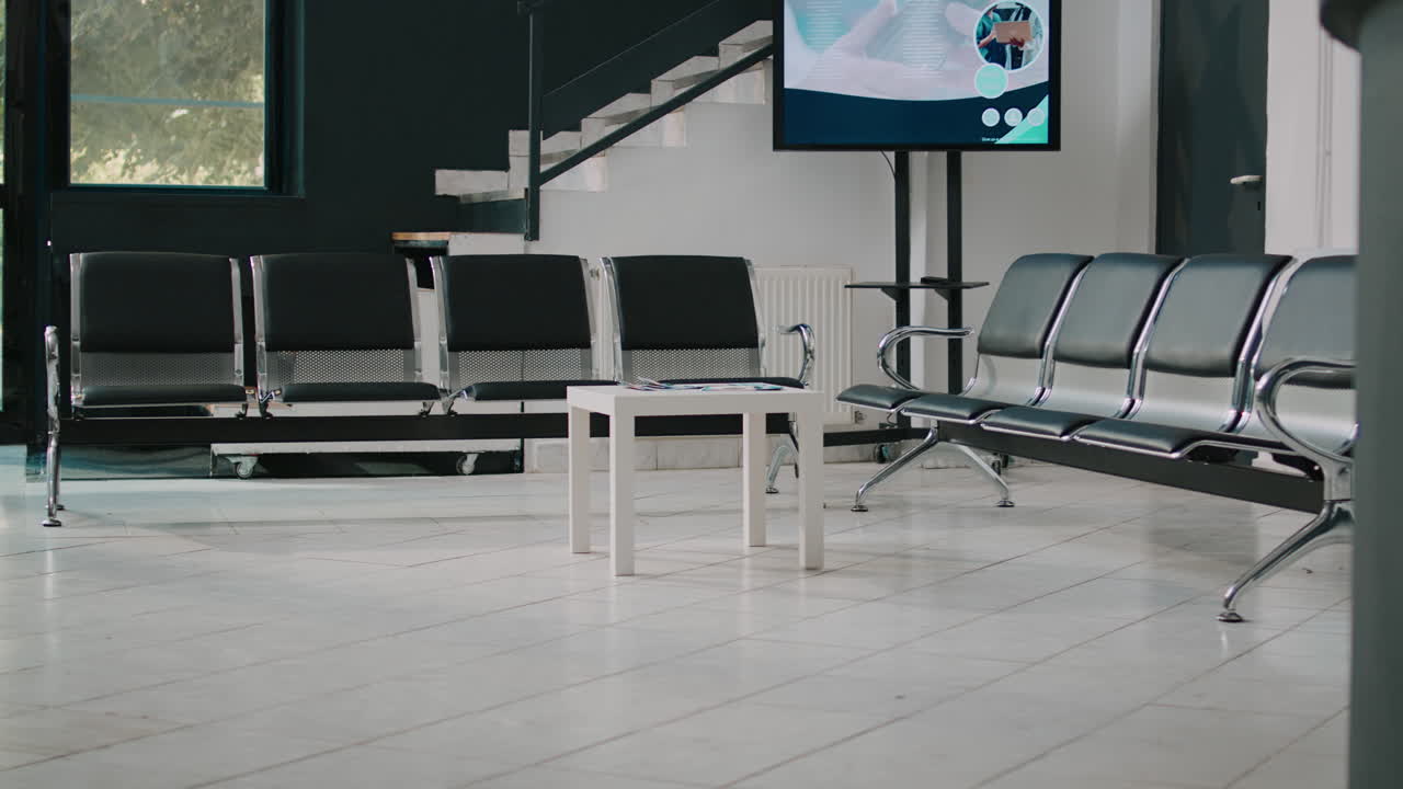 Empty facility waiting room with chairs to sit before attending checkup