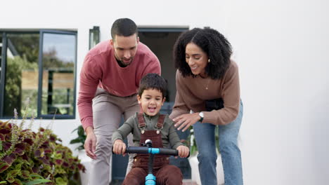 Kid,-learning-and-help-to-ride-a-bike