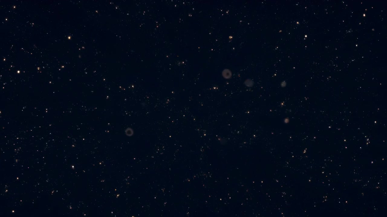 Abstract Golden Particles Sparkling and Floating on Dark Background ...