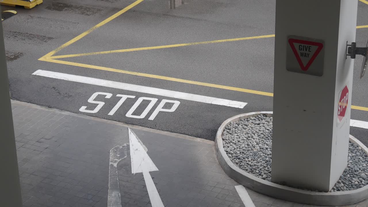 Road markings and signs in parking lot