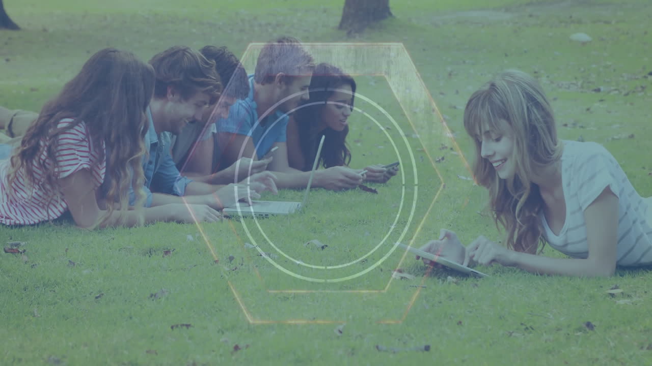 Using tablets and phones on grass, group with animation overlay