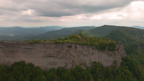 aerial views of the sanctuary of cabrera in catalonia, spain on a cliff