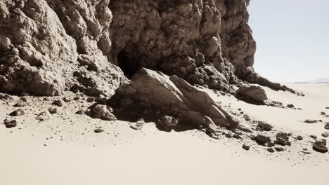 massive rock formation amid desert landscape