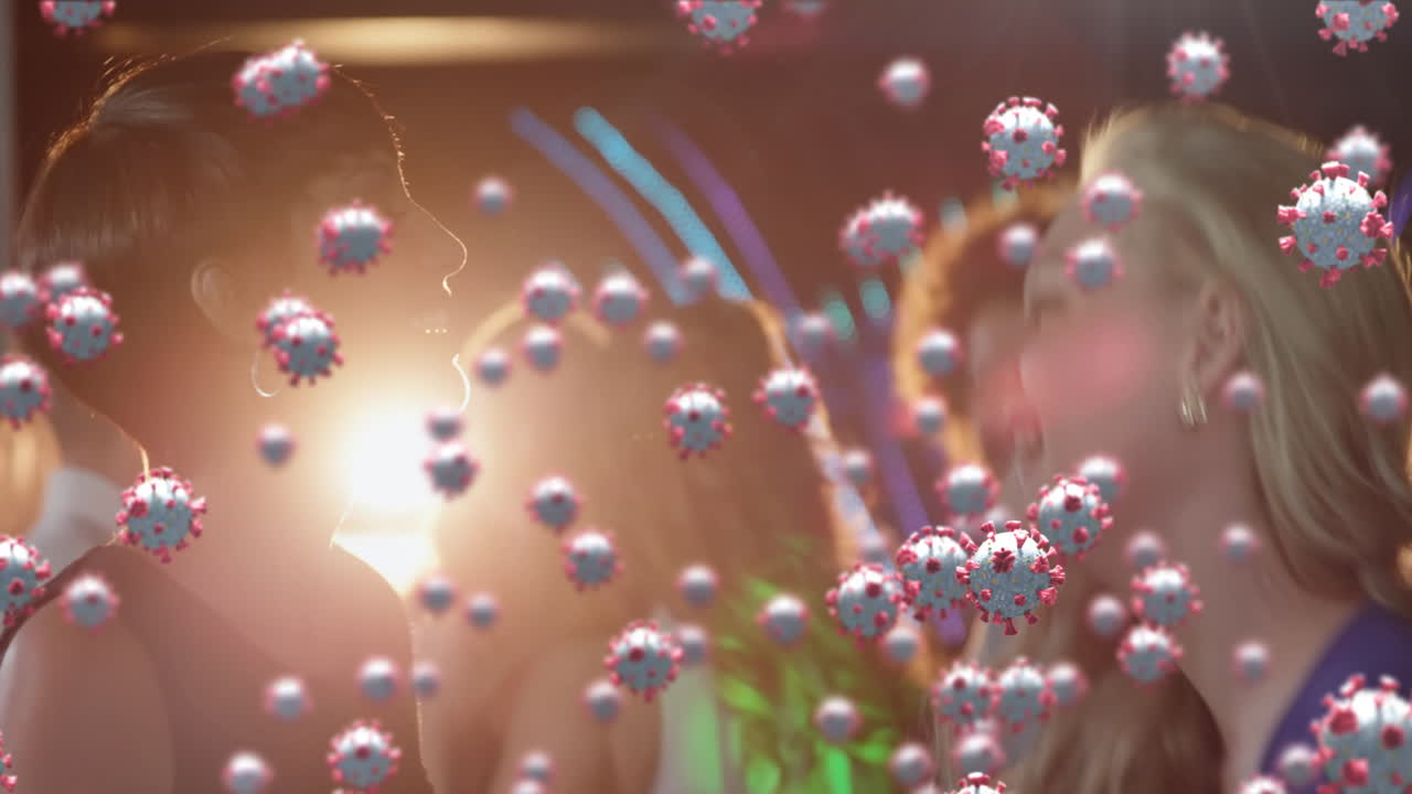 코로나19 세포가 배경에서 춤추는 친구 그룹을 상대로 움직이는 디지털 복합 비디오