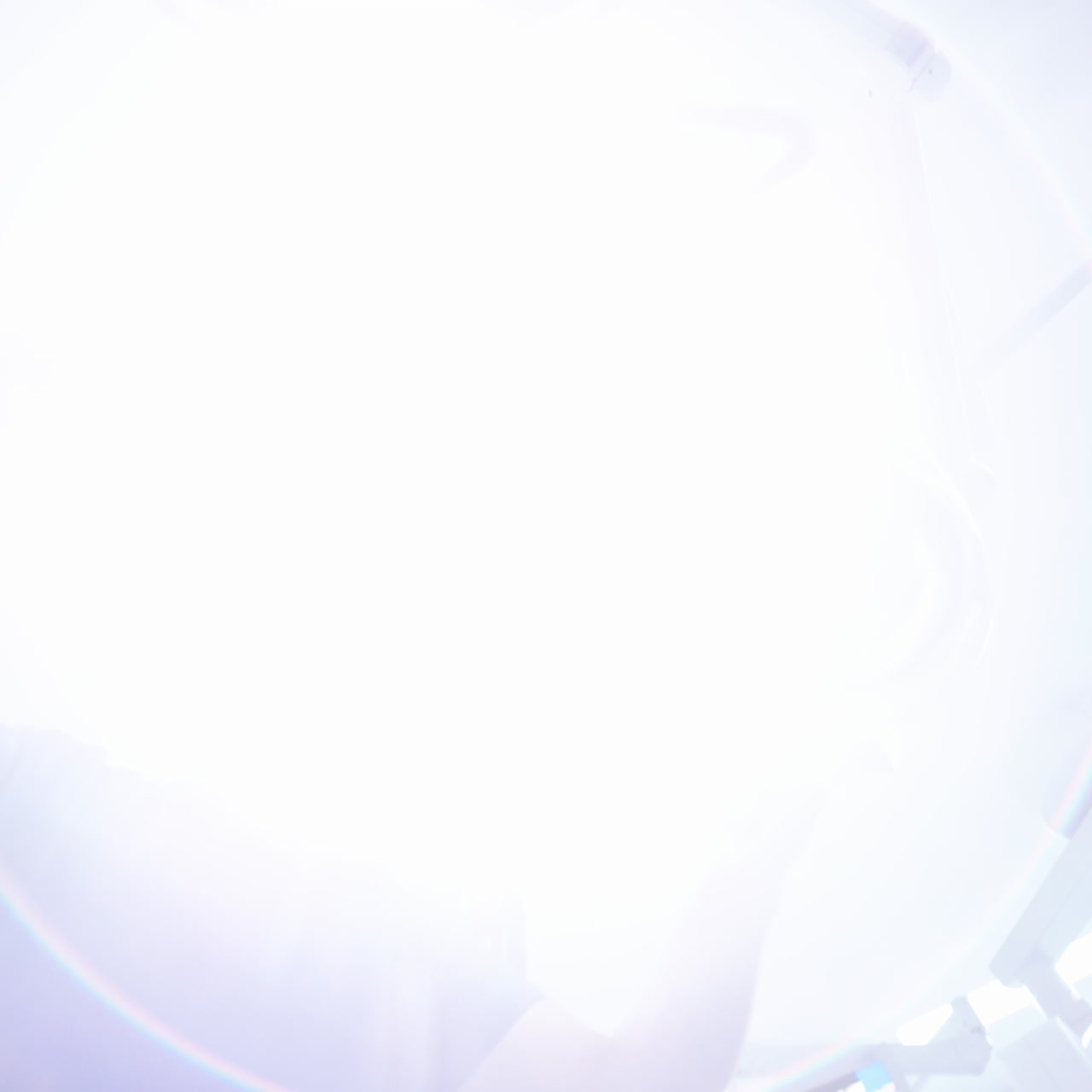 Vision correction with microscope. Surgeon's hands in gloves performing laser eye vision correction. ophthalmology , medicine, people health concept.