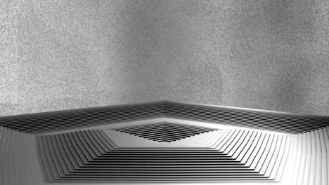 animation of grey stepped hexagonal pyramid podium rising and falling on blurred background