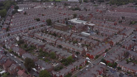 drone shot pulling away from old trafford suburbs 03