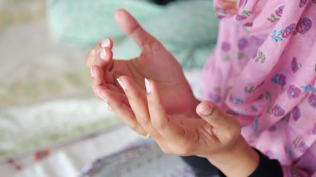 Muslim Woman's Hand Praying