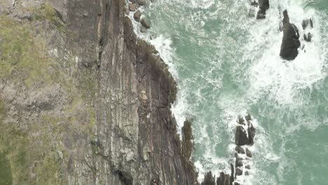 Flying-Above-Ocean-Cliffs-In-Ballycotton,-County-Cork,-Ireland---drone-shot