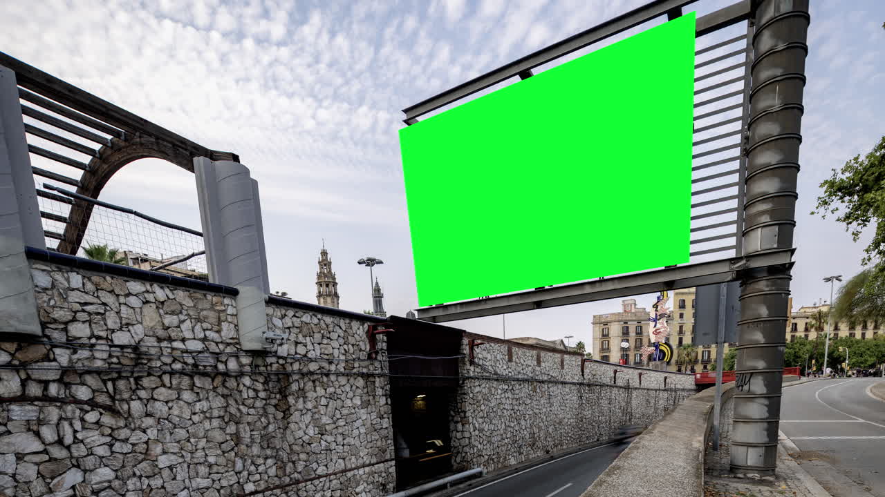 Rush of traffic on highway in city with green screen on the overhead video