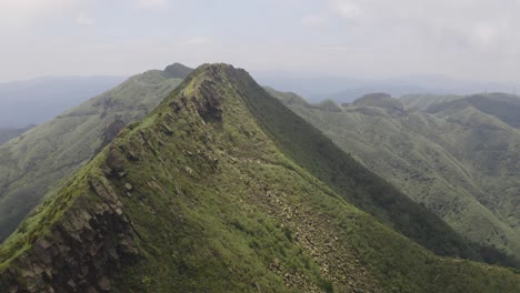 Famous-Teapot-Mountain-Near-At-Jiufen-With-Cloudy-Blue-Sky-Above---Beautiful-Tourist-Destination---Aerial-Shot