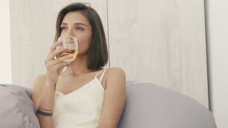 woman relaxing with a drink