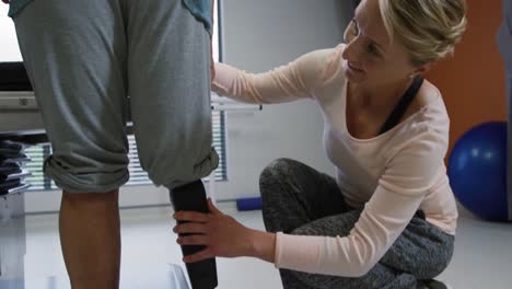 woman with prosthetic leg at hospital