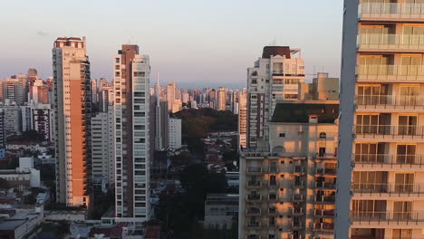 aerial view to sao paulo downtown, at sunset, brazil
