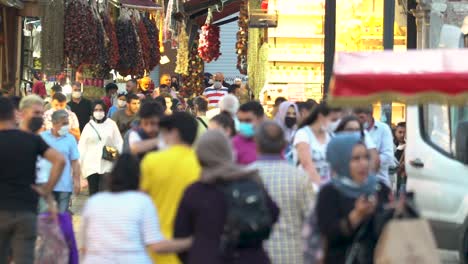 grand bazaar in istanbul, people wearing medical face masks