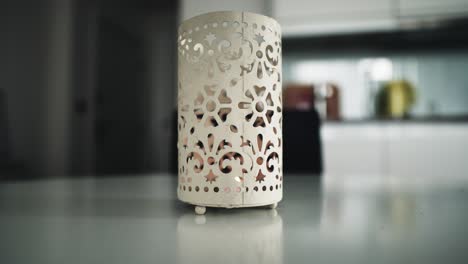 candle inside candle holder.