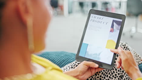 woman using tablet in office