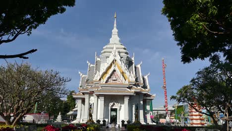 white and gold thai temple exterior, front, day